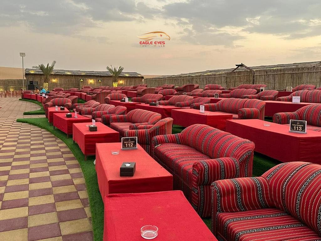 Right side view of sofa siting in luxury camp with beautiful weather in Desert Safari Dubai
