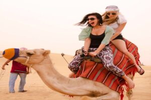 Camel riding with top dubai desert safari tours